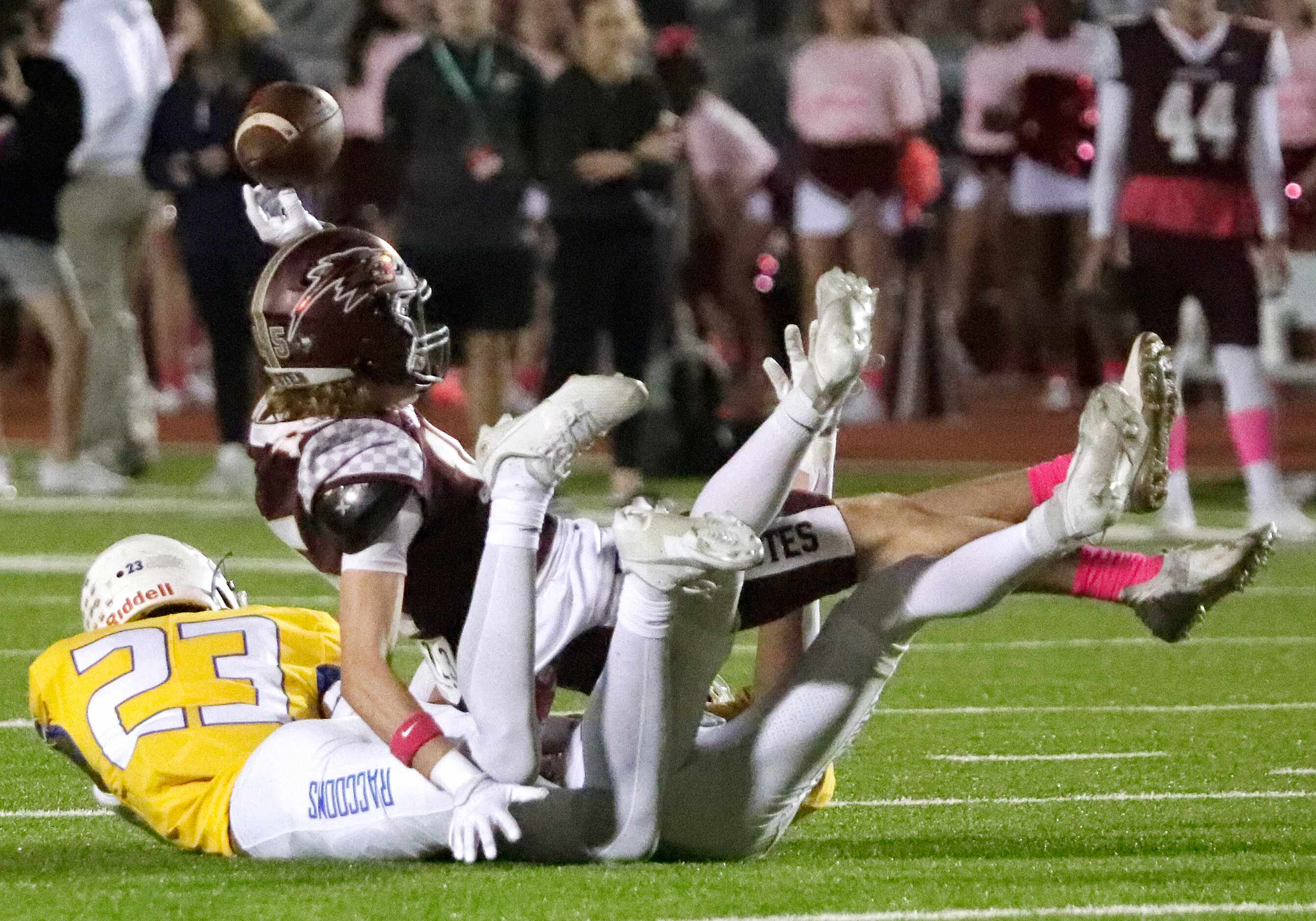 Frisco High School defensive back Jaylen Archibald (23) and Frisco High School defensive...