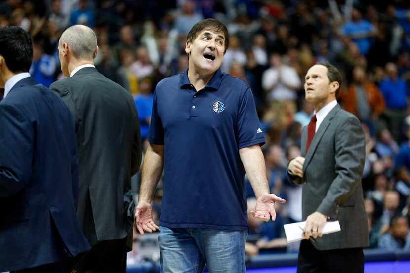 Dallas Mavericks owner Mark Cuban tries to get his point across to the officials during a...