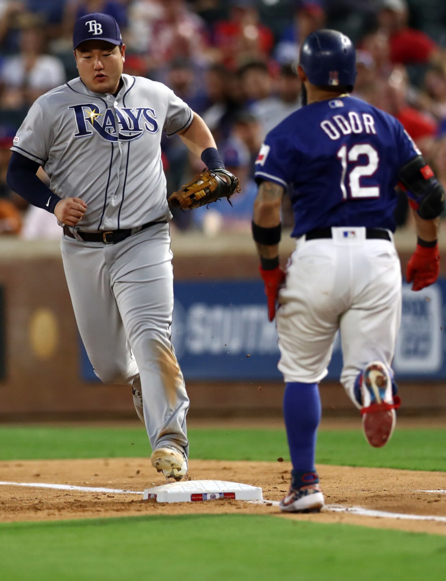 ARLINGTON, TEXAS - SEPTEMBER 10:  Ji-Man Choi #26 of the Tampa Bay Rays makes the out...