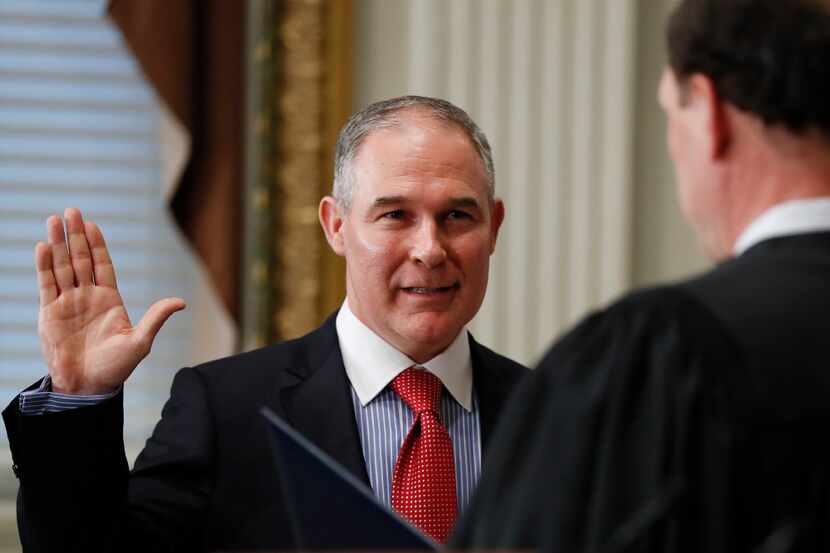 ustice Samuel Alito, right, swears in Scott Pruitt as the Environmental Protection Agency...