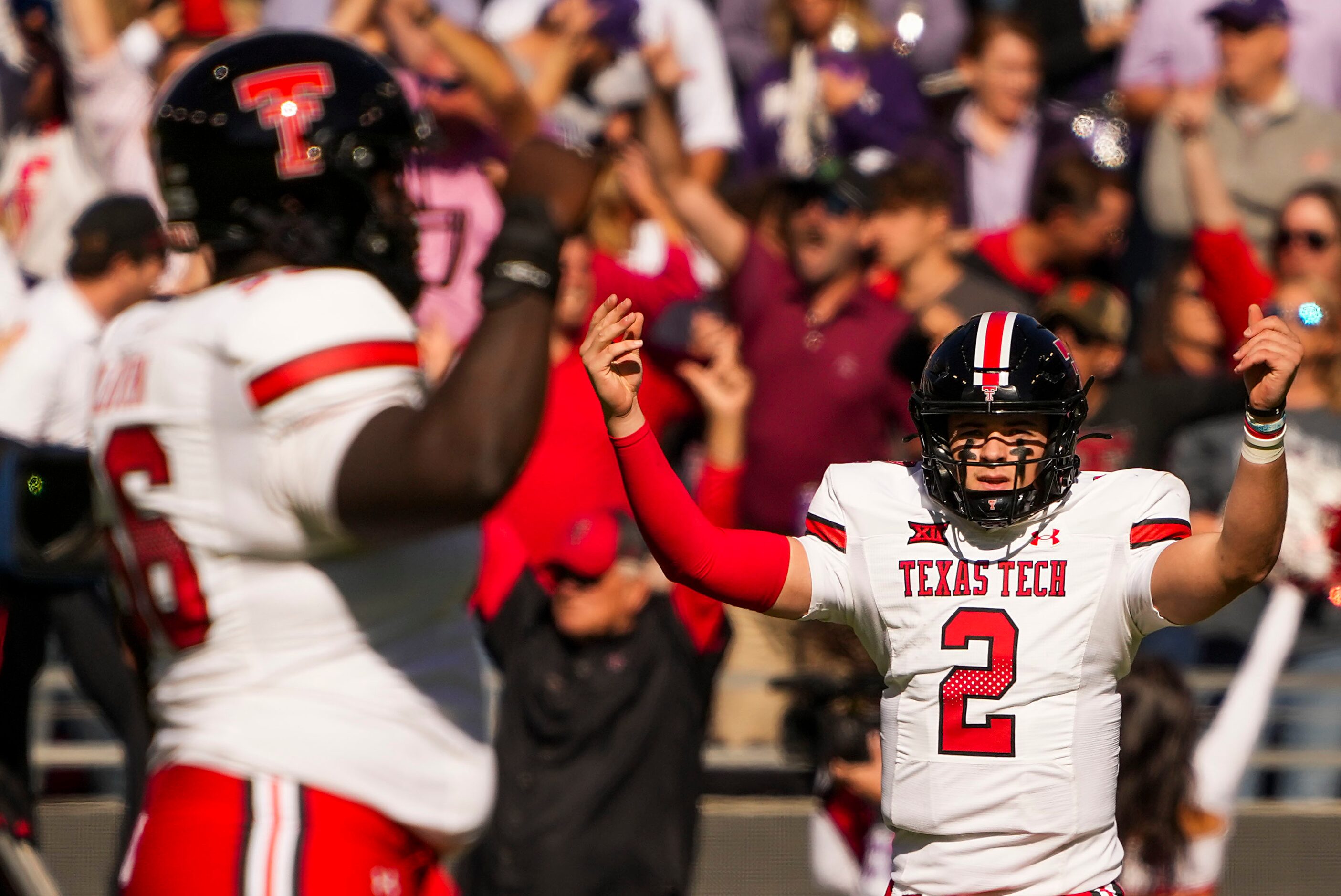 Texas Tech quarterback Behren Morton (2) celebrates after throwing a touchdown pass during...