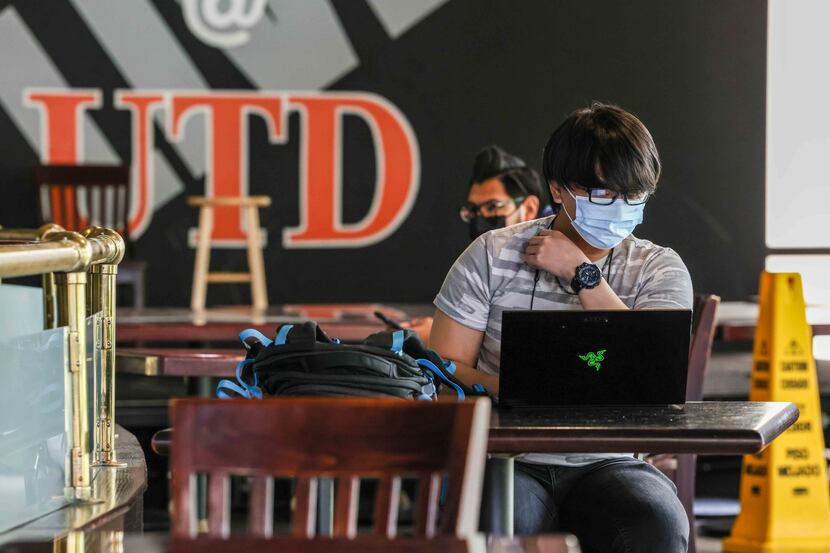 Matthew Vu, 20, a University of Texas at Dallas student, spends time on his laptop at the...