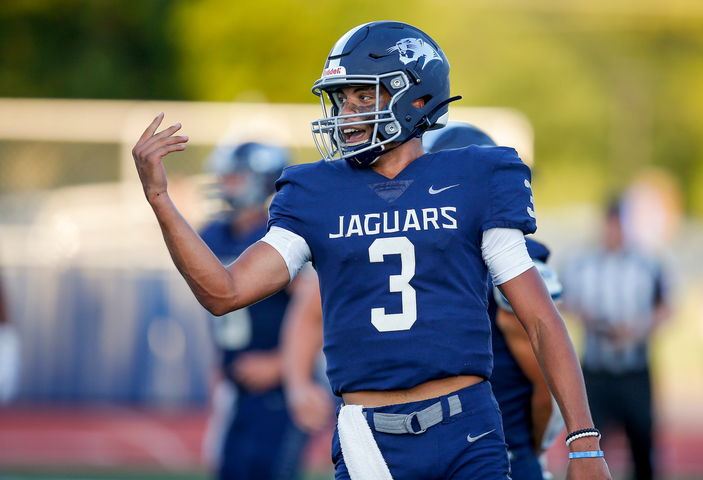 Flower Mound senior quarterback Nick Evers (3) celebrates scoring a touchdown during the...