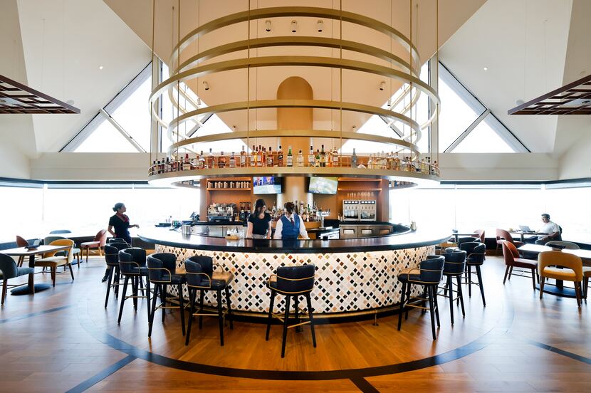 An interior view of the restyled mid-century modern Constellation Club bar atop The Towers...