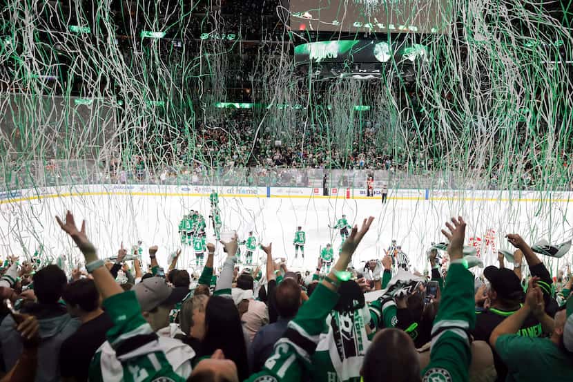 Paper streamers rain down on fans after the Dallas Stars defeated the Calgary Flames in Game...