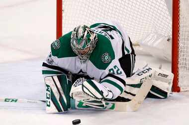 Dallas Stars goalie Kari Lehtonen makes a save during the second period of an NHL hockey...