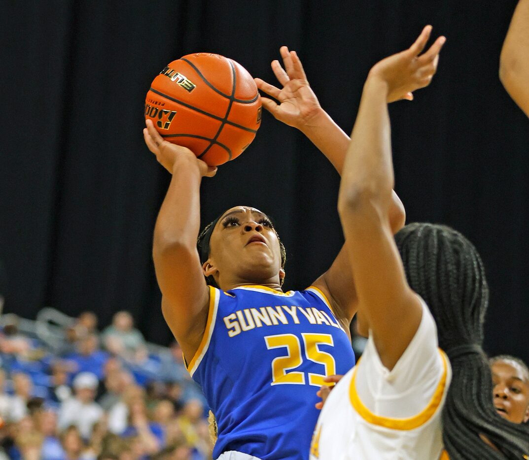 Sunnyvale Micah Russell (25) tries to shoot over a La Vega players in girls basketball Class...