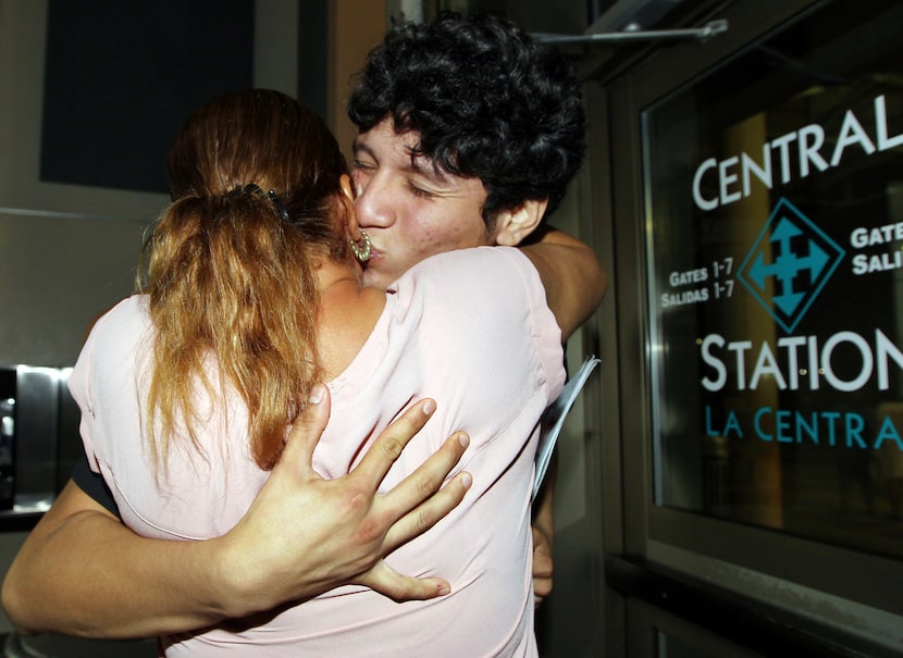 Francisco Galicia, right, kisses his mother Sanjuana Galicia at the McAllen, Texas, Central...