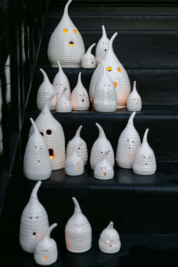 Georgia-based pottery artist Mollie Jenkins makes these cute ghosts, which fit a tea light...