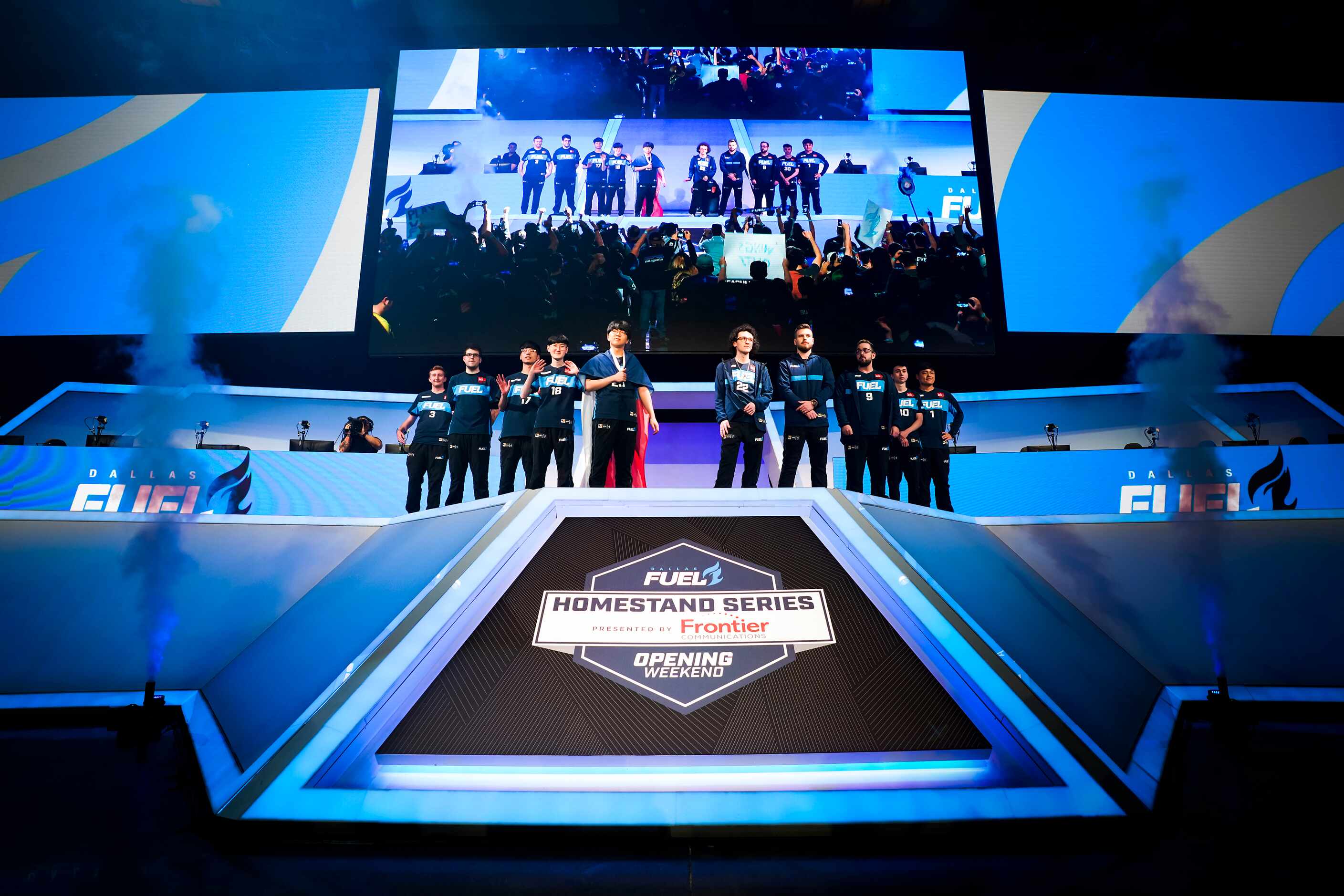 Members of the Dallas Fuel take the stage for a Overwatch League match against the Los...