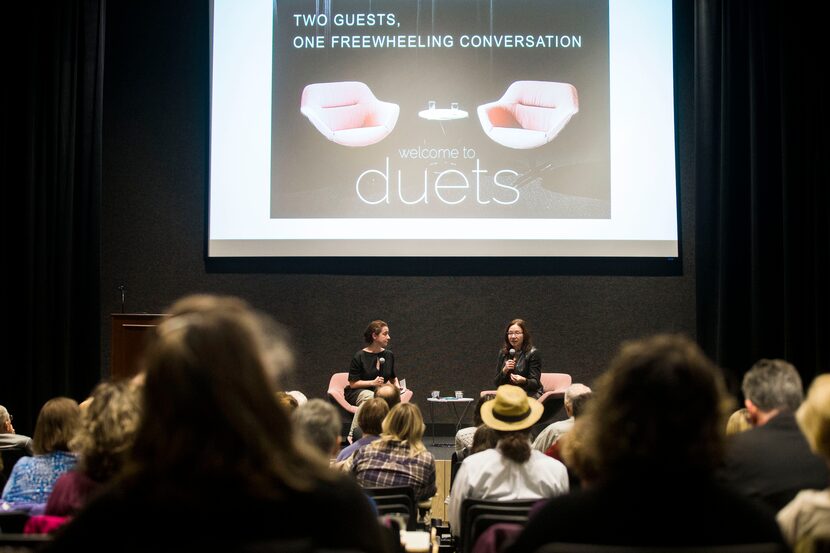 Anna Kuchment, science reporter at The Dallas Morning News, left, listens to Katharine...