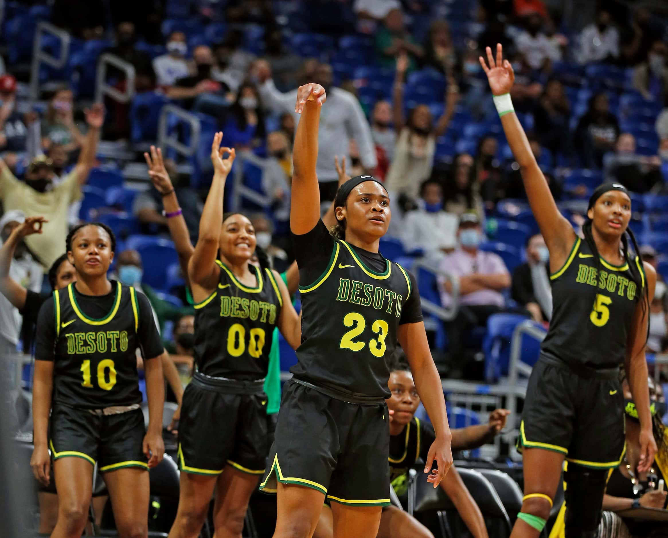 DeSoto Kendall Brown #23 and teammates watch her three. DeSoto vs. Cypress Creek girls...