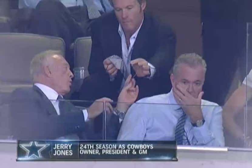 Jerry Jones gets his cleaned glasses back during Wednesday's NBC broadcast of the...