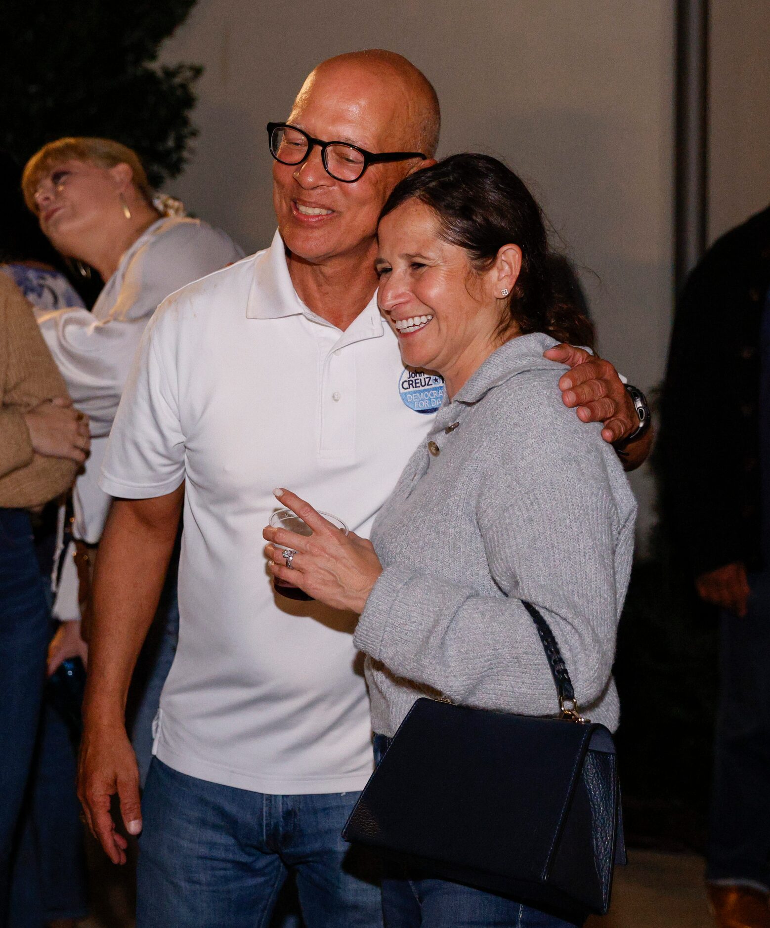 Dallas County District Attorney John Creuzot embraces Maricela Moore, Democratic nominee for...