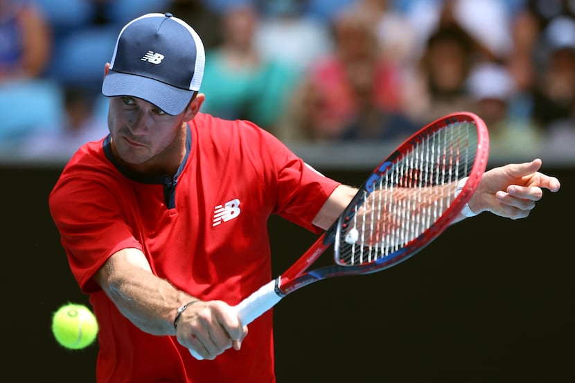 Tommy Paul of the U.S. plays a backhand return to Miomir Kecmanovic of Serbia during their...