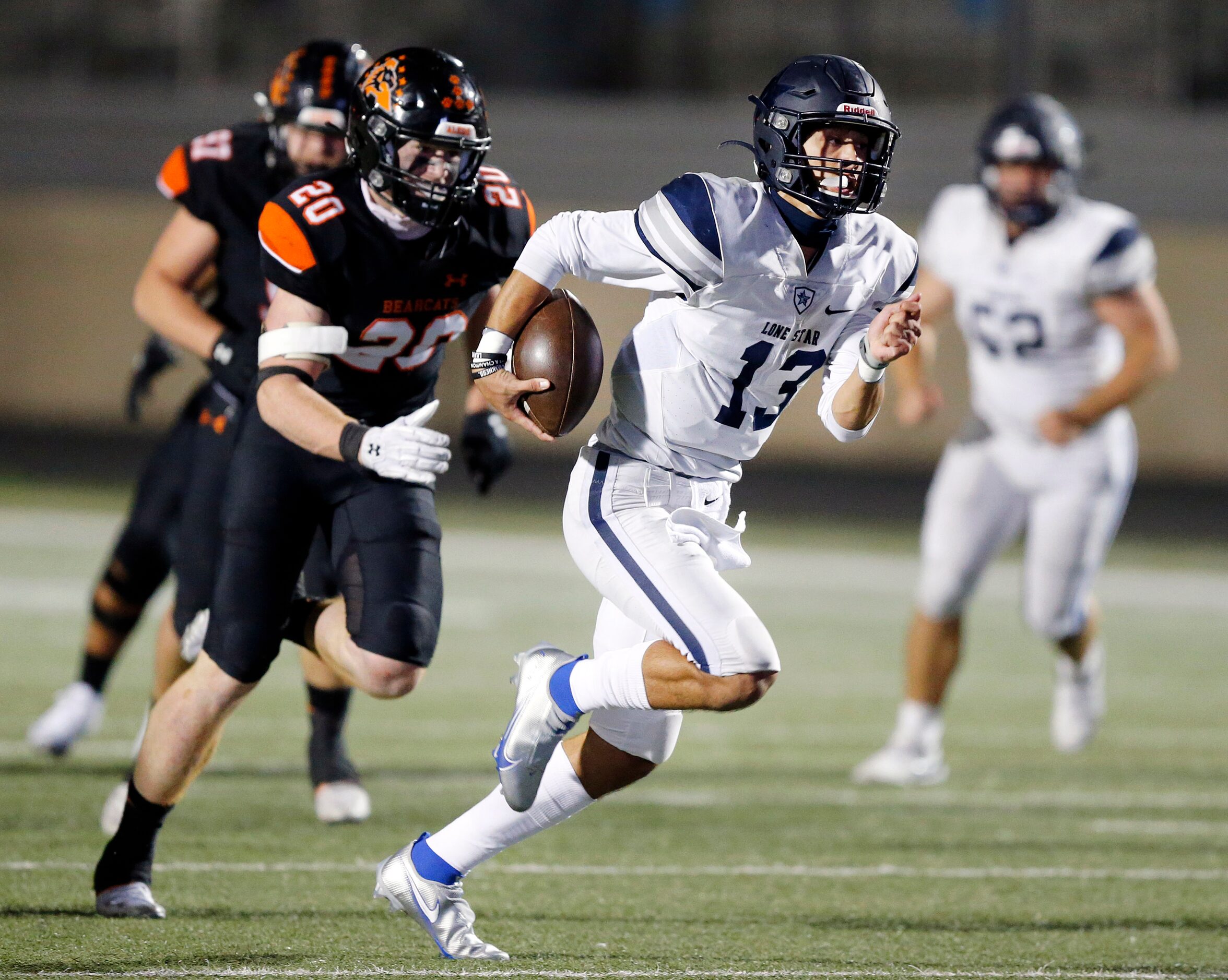 Frisco Lone Star quarterback Garret Rangel breaks away for a big run in the fourth quarter...