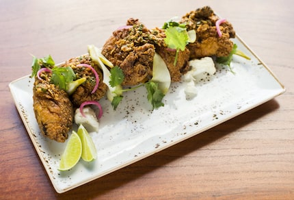 Rapscallion in Dallas serves brined, rotisseried and hot fried chicken.