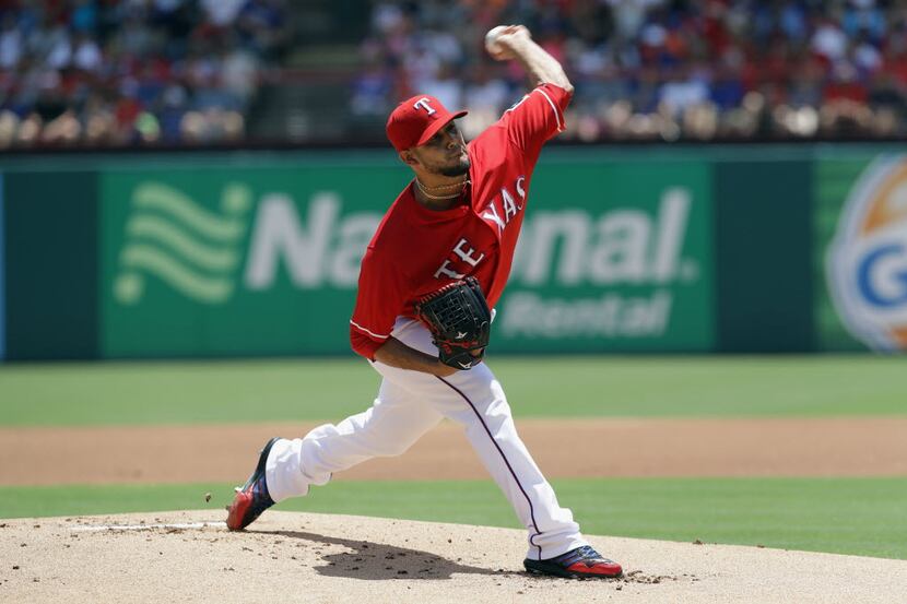 ARLINGTON, TX - JUNE 26:  Martin Perez #33 of the Texas Rangers throws against the Boston...