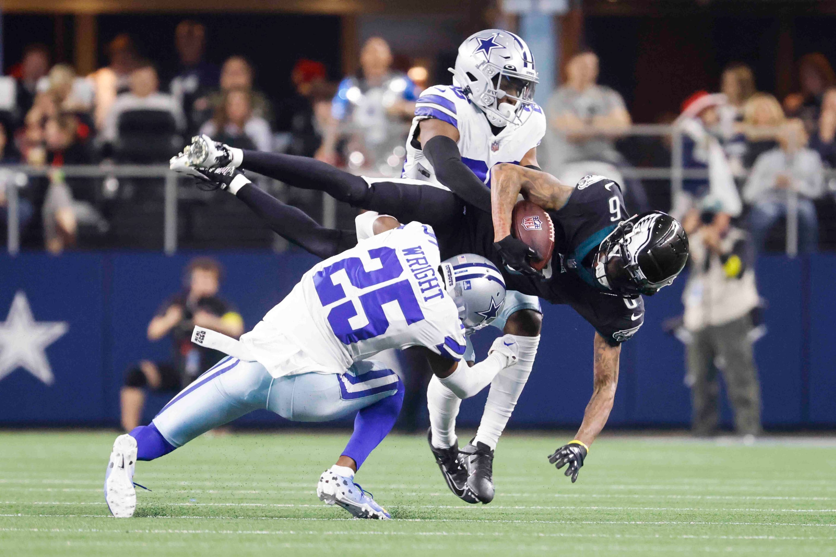 Philadelphia Eagles wide receiver DeVonta Smith (6), center, receives a pass past Dallas...