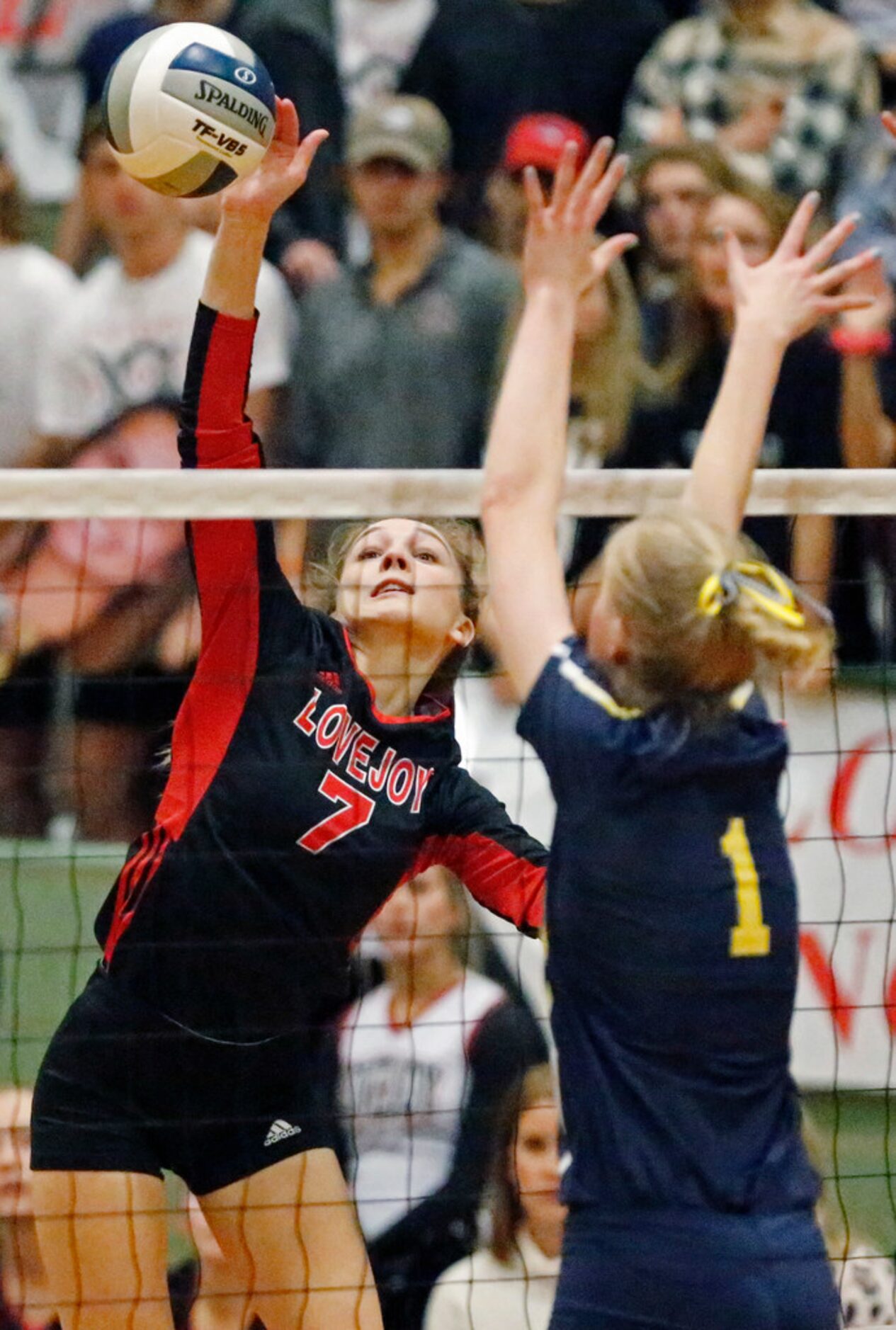 Lovejoy High School Ellie Jonke (7) gets a hit past Highland Park High School middle hitter...