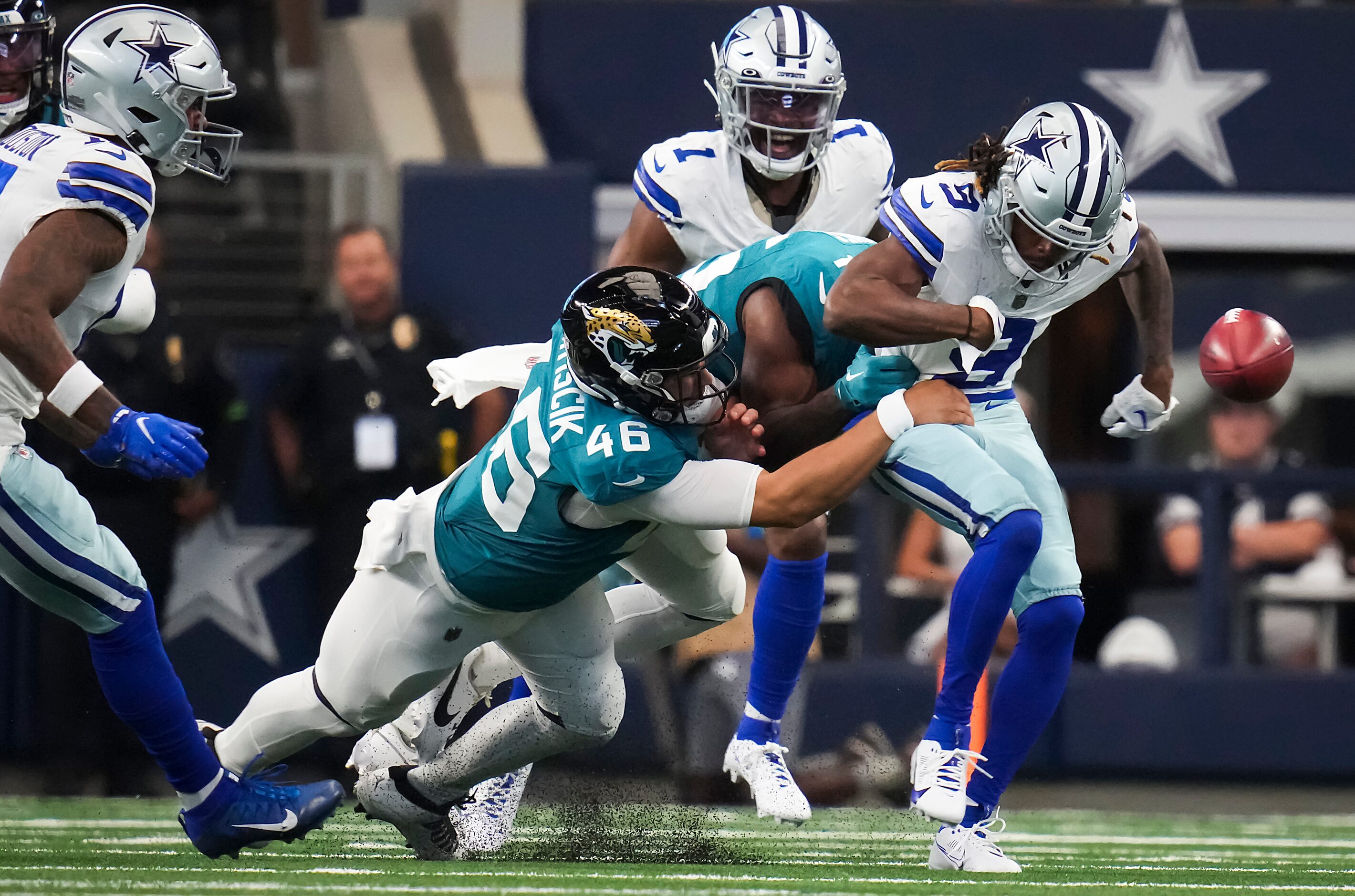 Dallas Cowboys wide receiver KaVontae Turpin (9) fumbles on a punt return as Jacksonville...