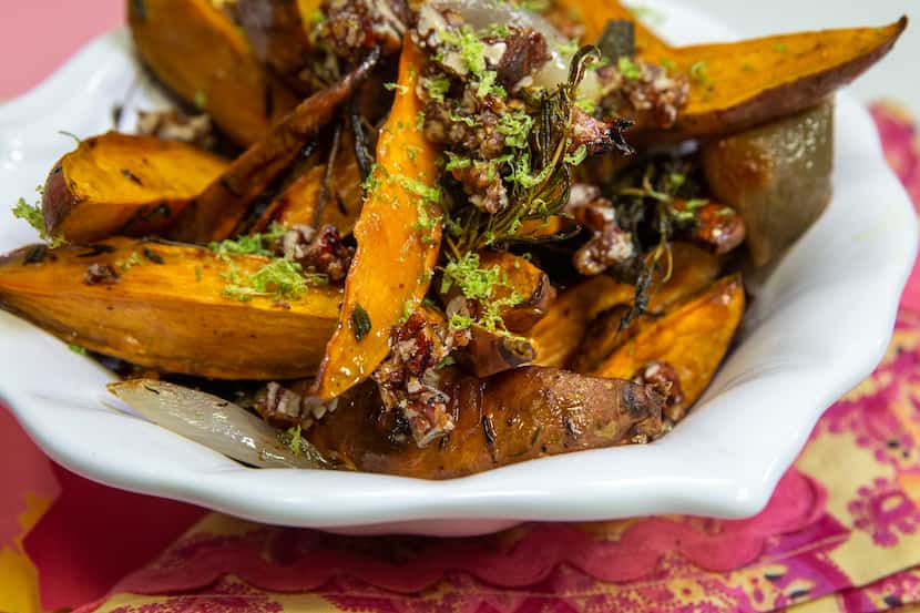 Roasted Sweet Potatoes and Shallots is topped with lime zest and Spicy Pecans — made with...