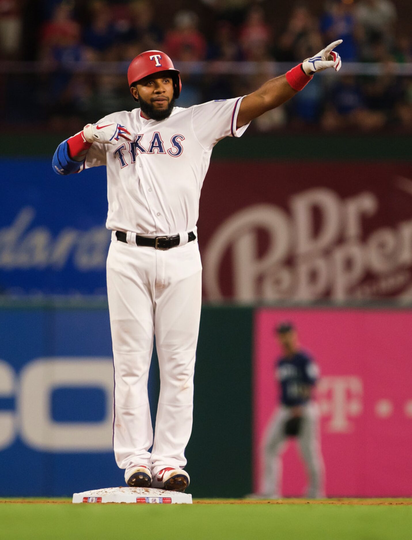 Texas Rangers shortstop Elvis Andrus celebrates after hitting a leadoff double in the bottom...