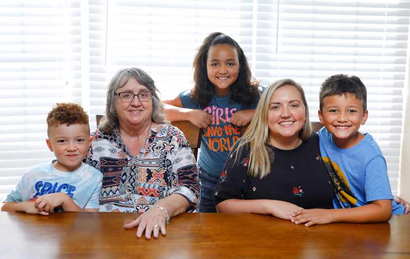 Shannon Cooper (second from right) is pictured with her mother Laurie Walker and her kids...