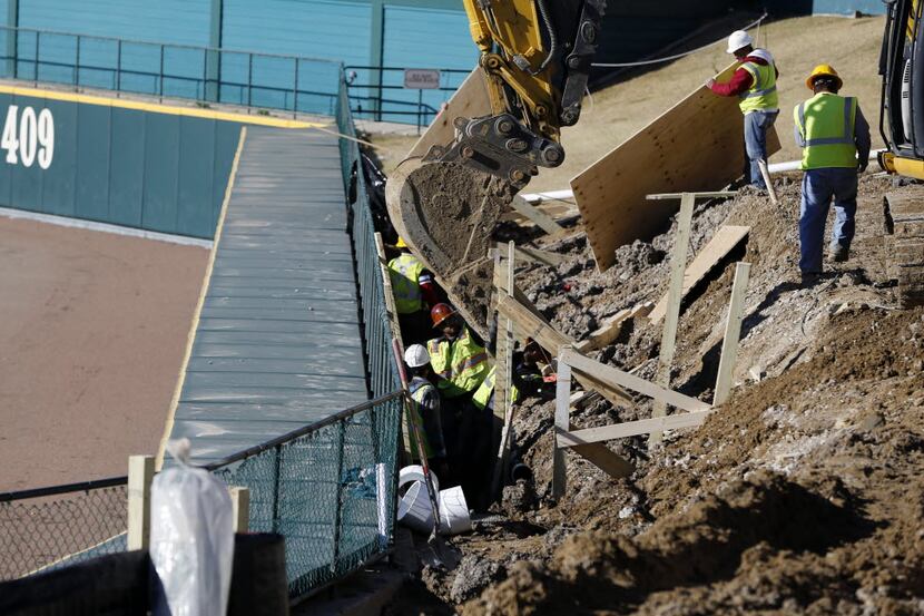  Construction crews worked on the lazy river just beyond the right field fence at Dr Pepper...