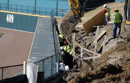  Construction crews worked on the lazy river just beyond the right field fence at Dr Pepper...