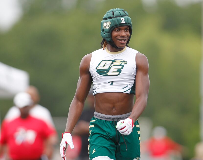 DeSoto's Mario Buford (2) was all smiles after breaking up a pass against Katy Tomkins at...