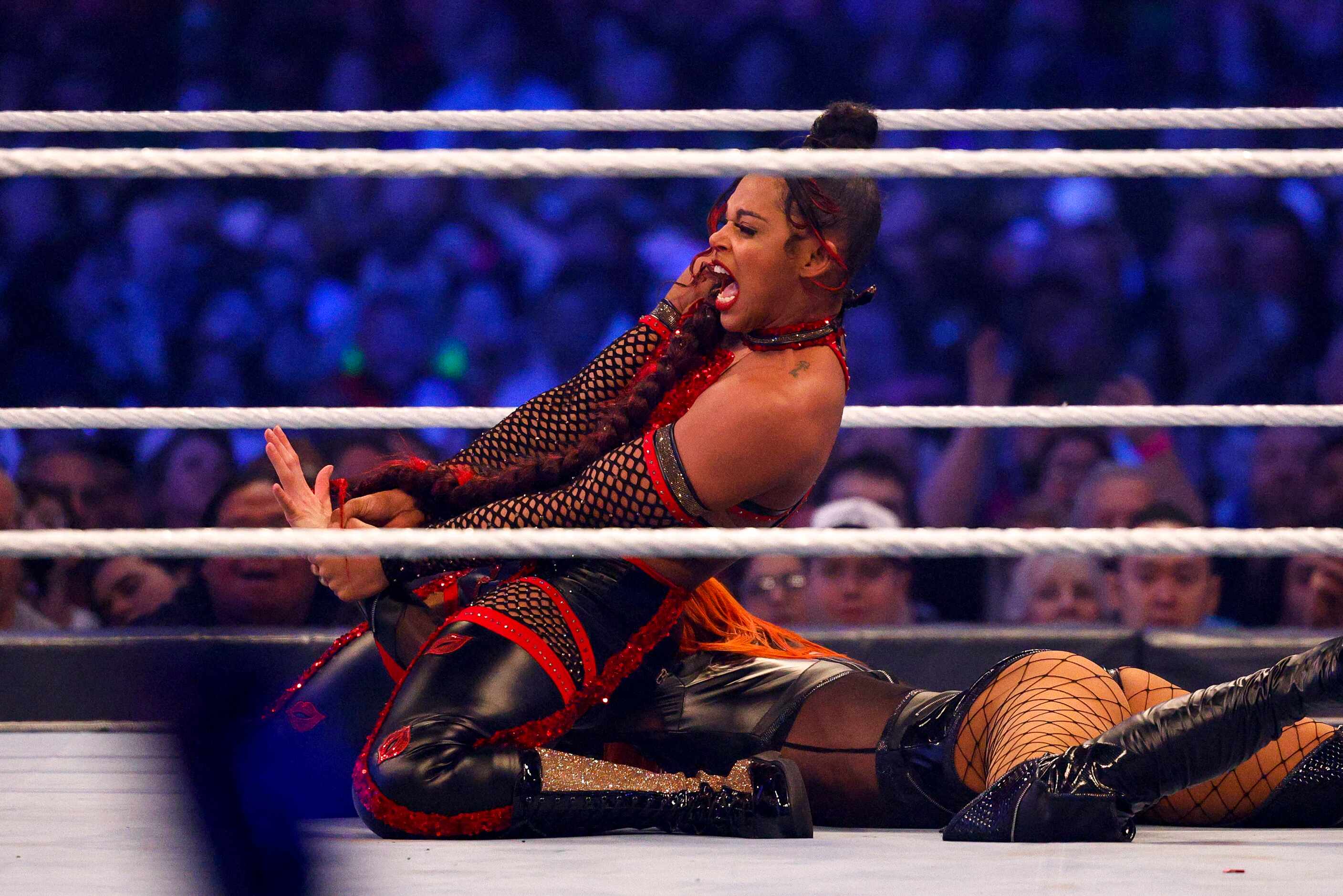 Bianca Belair pins Becky Lynch during the Raw Women's Championship match at WrestleMania 38...