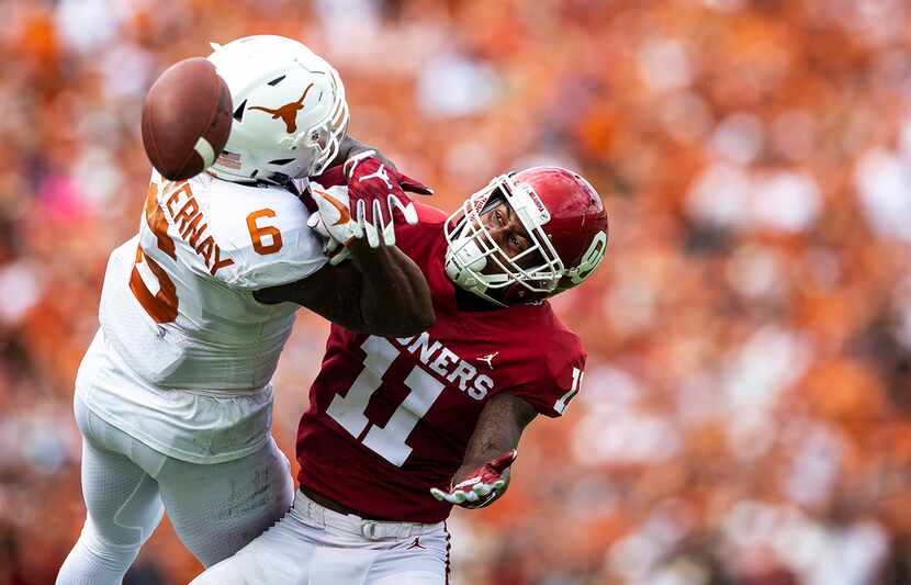FILE - In this Oct. 6, 2018, file photo, Oklahoma cornerback Parnell Motley (11) contests a...
