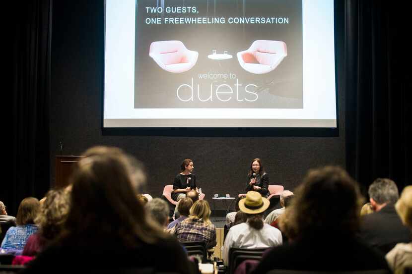 Anna Kuchment (left), science reporter at The Dallas Morning News, listens to Katharine...