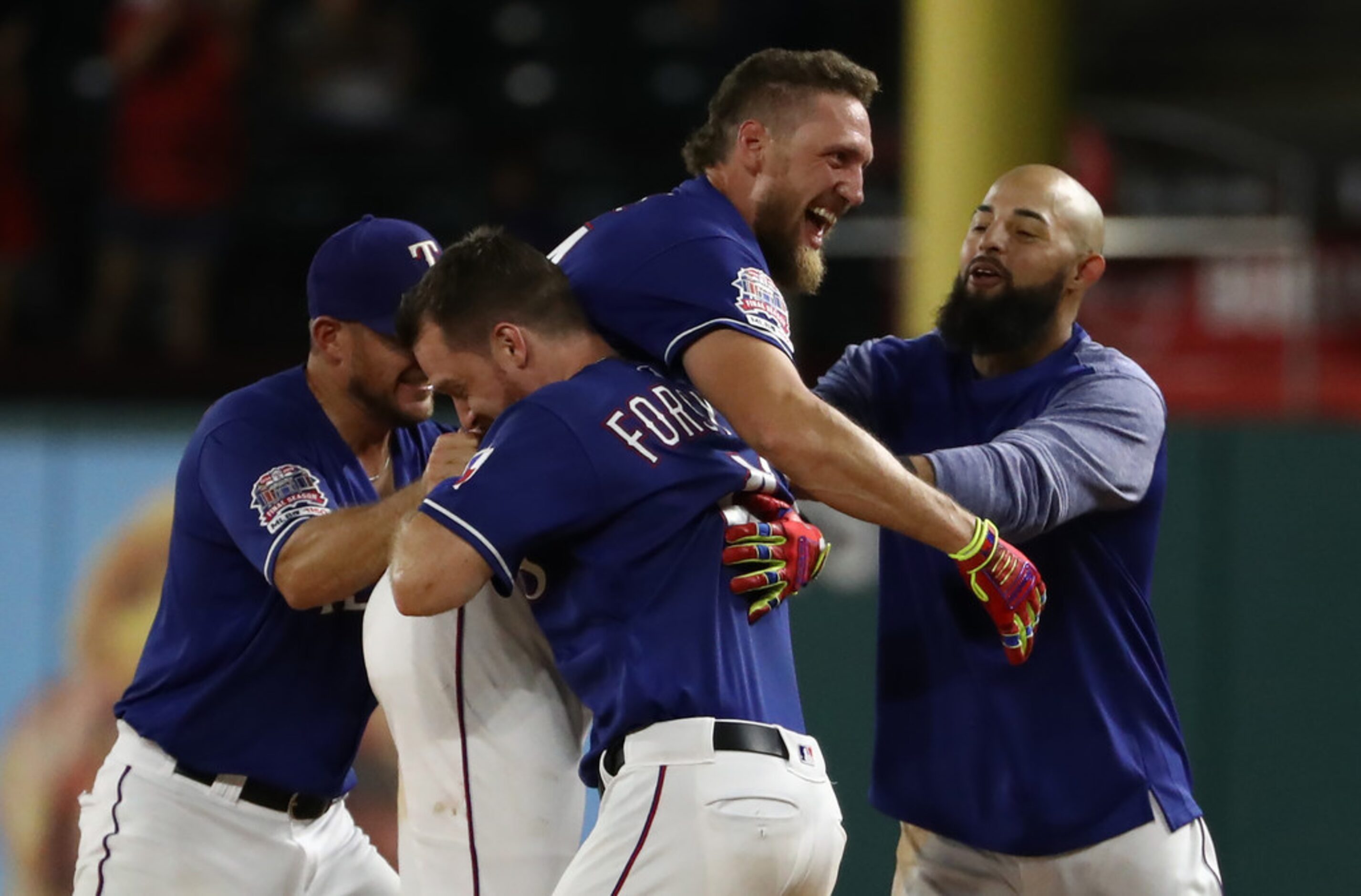 ARLINGTON, TEXAS - AUGUST 21:  Hunter Pence #24 of the Texas Rangers celebrates a walk off...