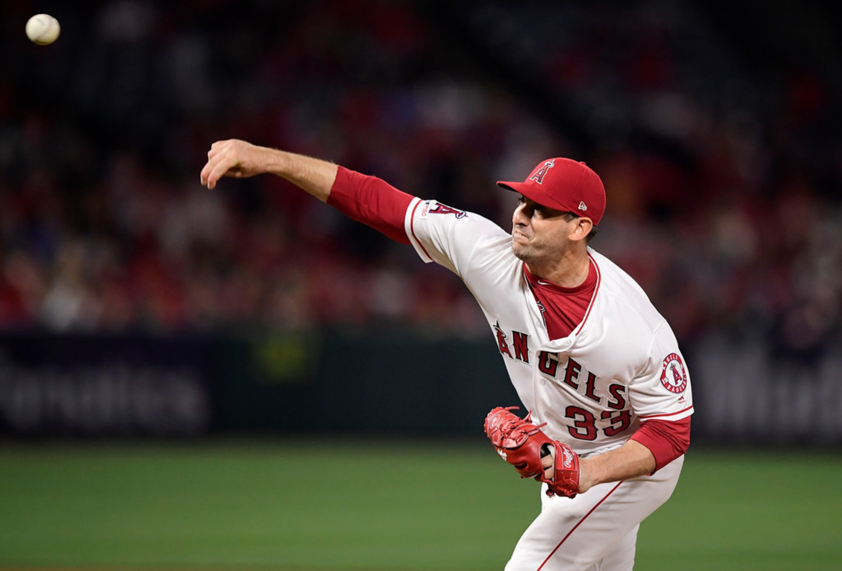 Los Angeles Angels starting pitcher Matt Harvey throws during the second inning of the...