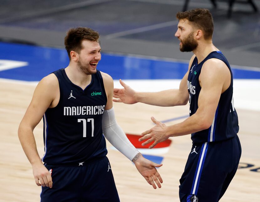 Dallas Mavericks guard Luka Doncic (77) celebrates with Dallas Mavericks forward Maxi Kleber...