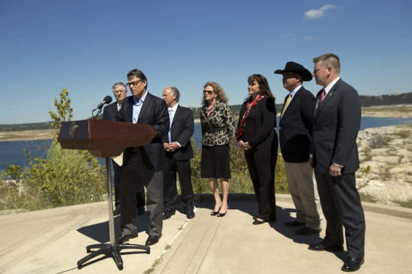 Texas Gov. Rick Perry used the depleted Lake Travis as a backdrop Wednesday for his appeal...