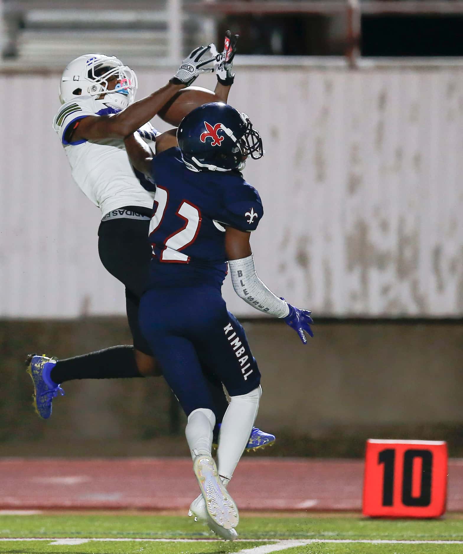 Conrad senior Tony King, left, is unable to make the catch as Kimball sophomore cornerback...