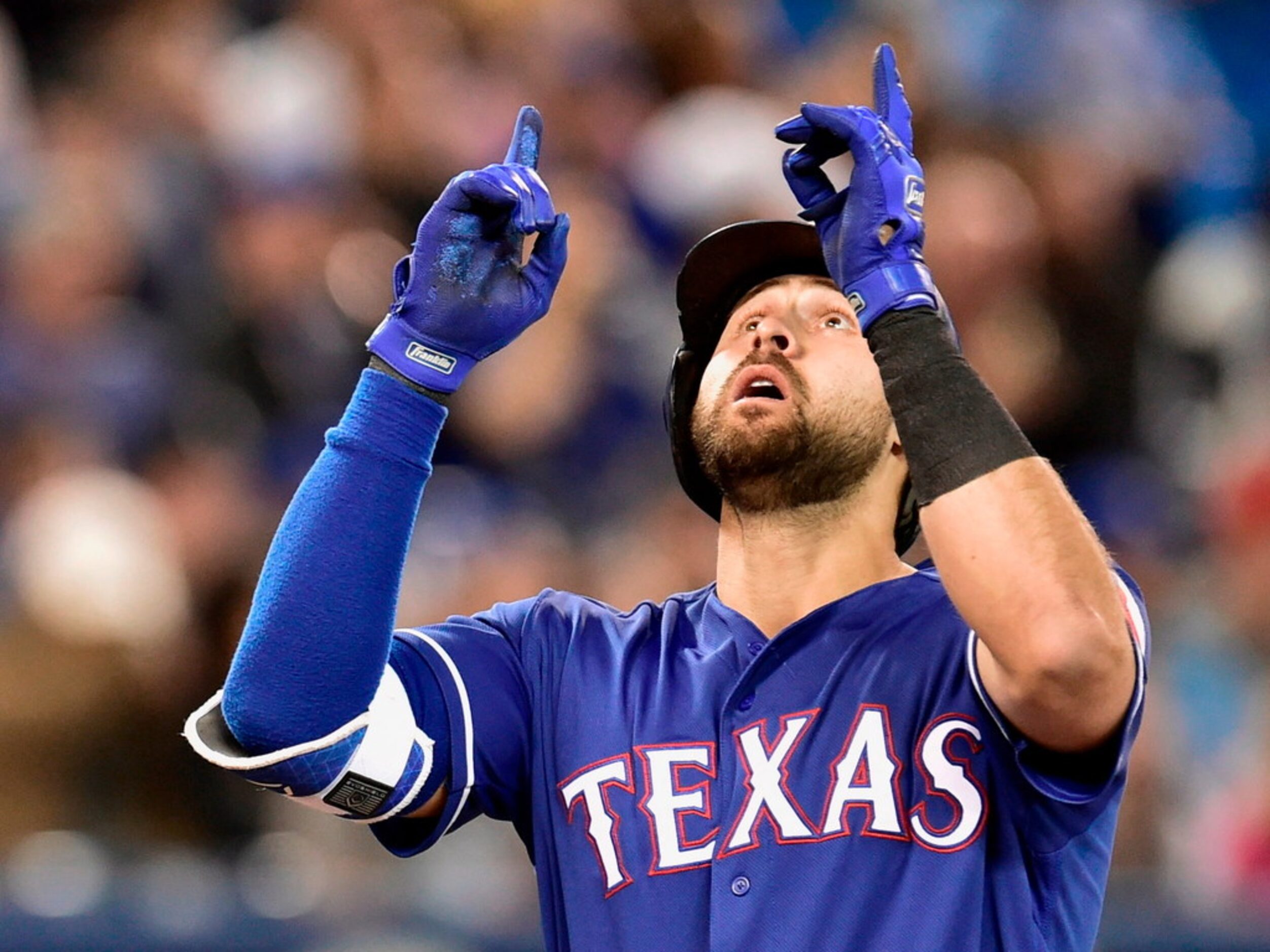 Texas Rangers third baseman Joey Gallo celebrates after hitting a two-run home run against...