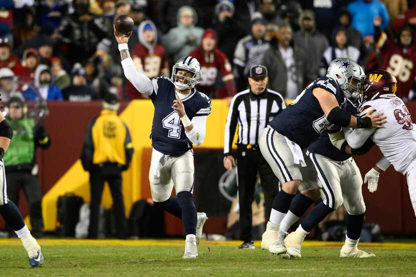 Dallas Cowboys quarterback Dak Prescott (4) throwing the ball downfield during the second...