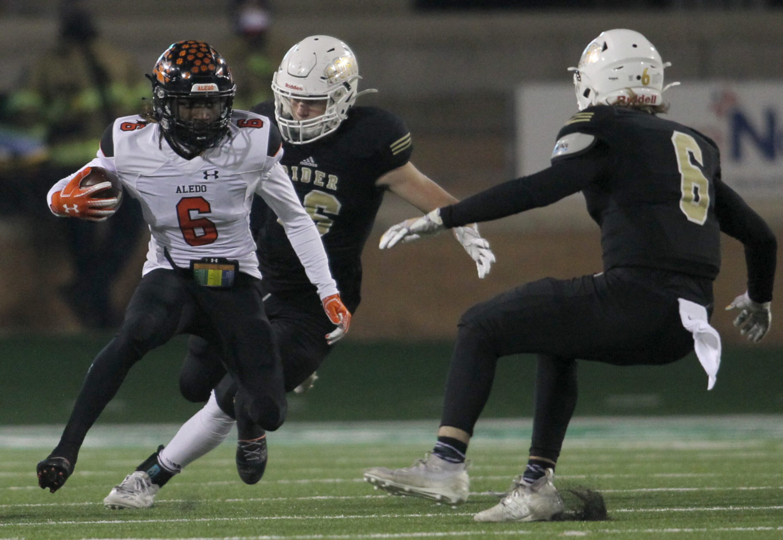 Aledo running back Demarco Roberts (6) makes a jump-cut during a first quarter rush as...