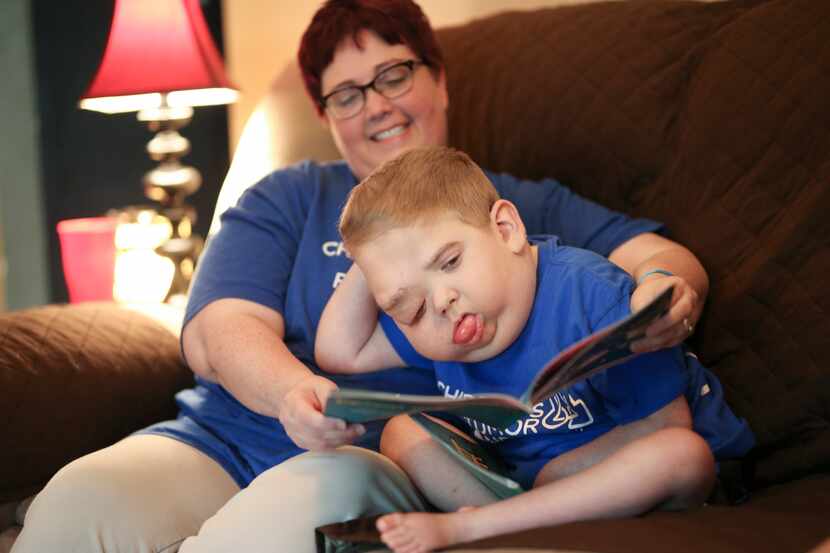 Jane Fergus of Lawrence, Kan., says Medicaid pays all the medical bills for her son,...