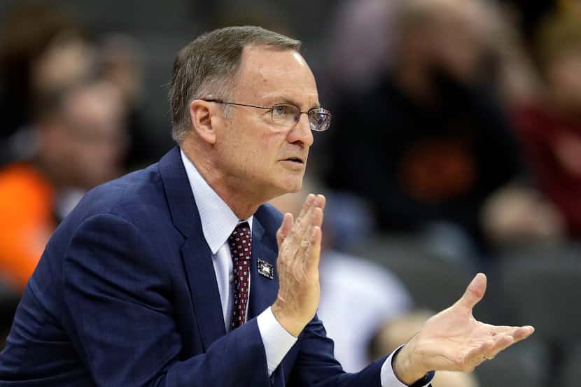 FILE - In this Wednesday, March 7, 2018 file photo, Oklahoma coach Lon Kruger applauds his...