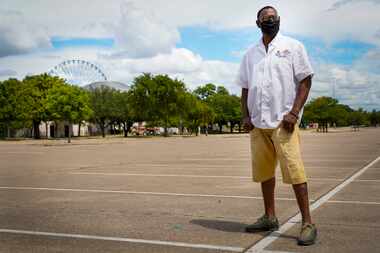 Perry Eakles, a seasonal parking attendant at the State Fair of Texas, photographed in lot 5...