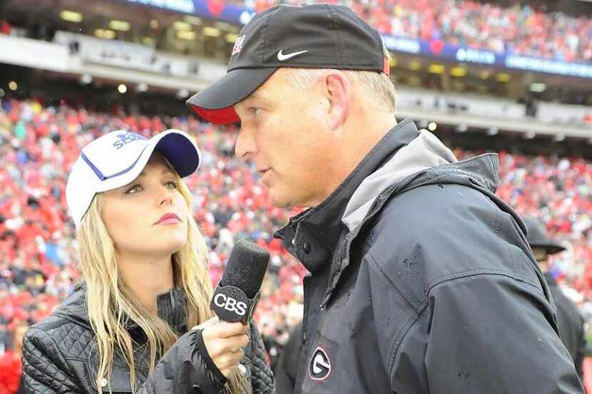 Allie LaForce talks with Mark Richt during the Georgia-Alabama game on Oct. 3, 2015.