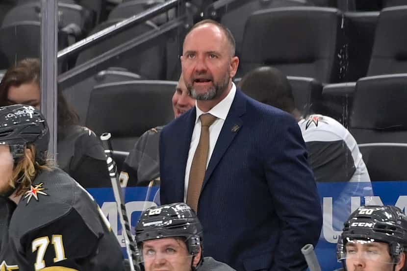 FILE - Vegas Golden Knights coach Peter DeBoer watches from the bench during the third...