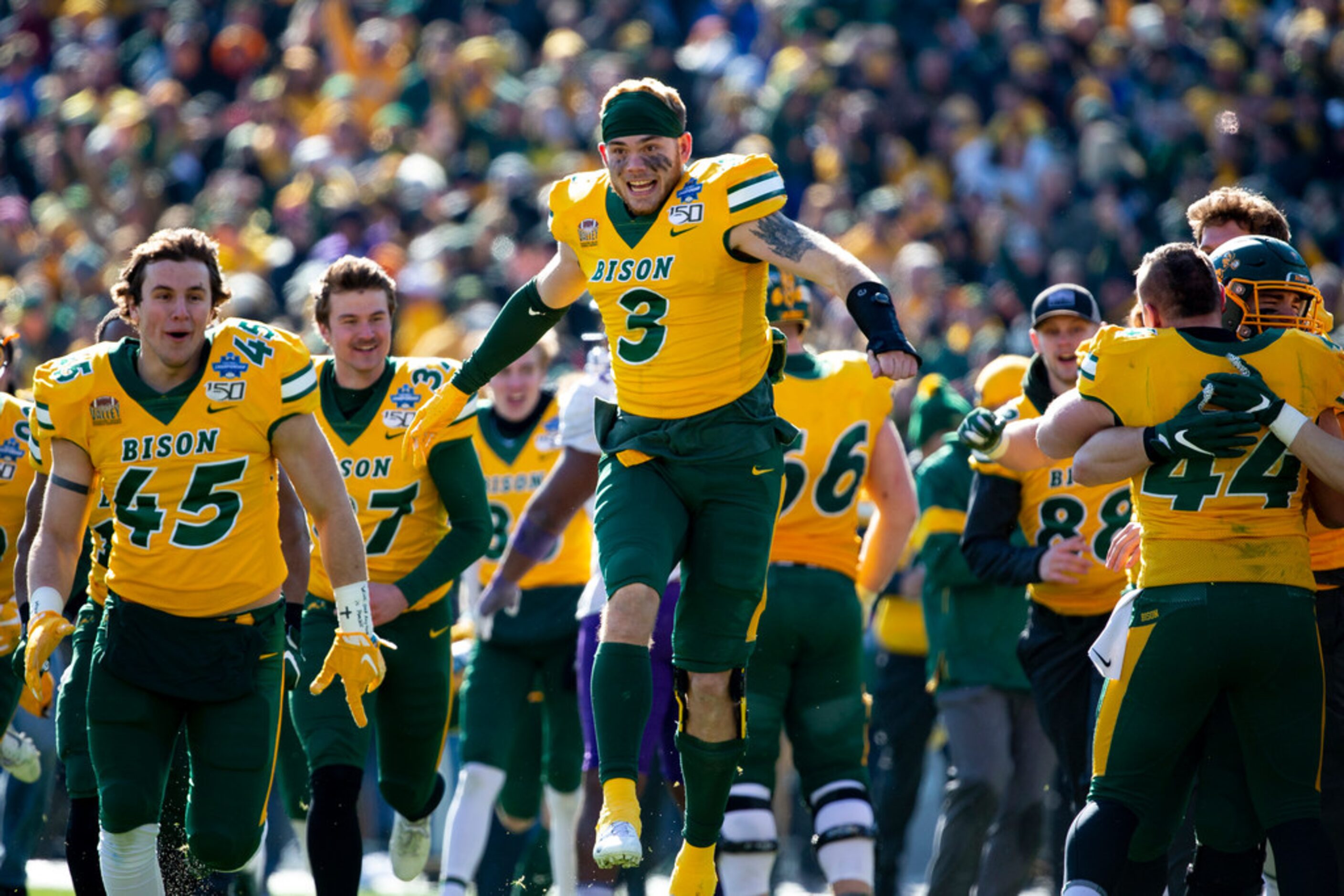 North Dakota State linebacker Jaxon Brown (3) celebrates after beating James Madison 28-20...