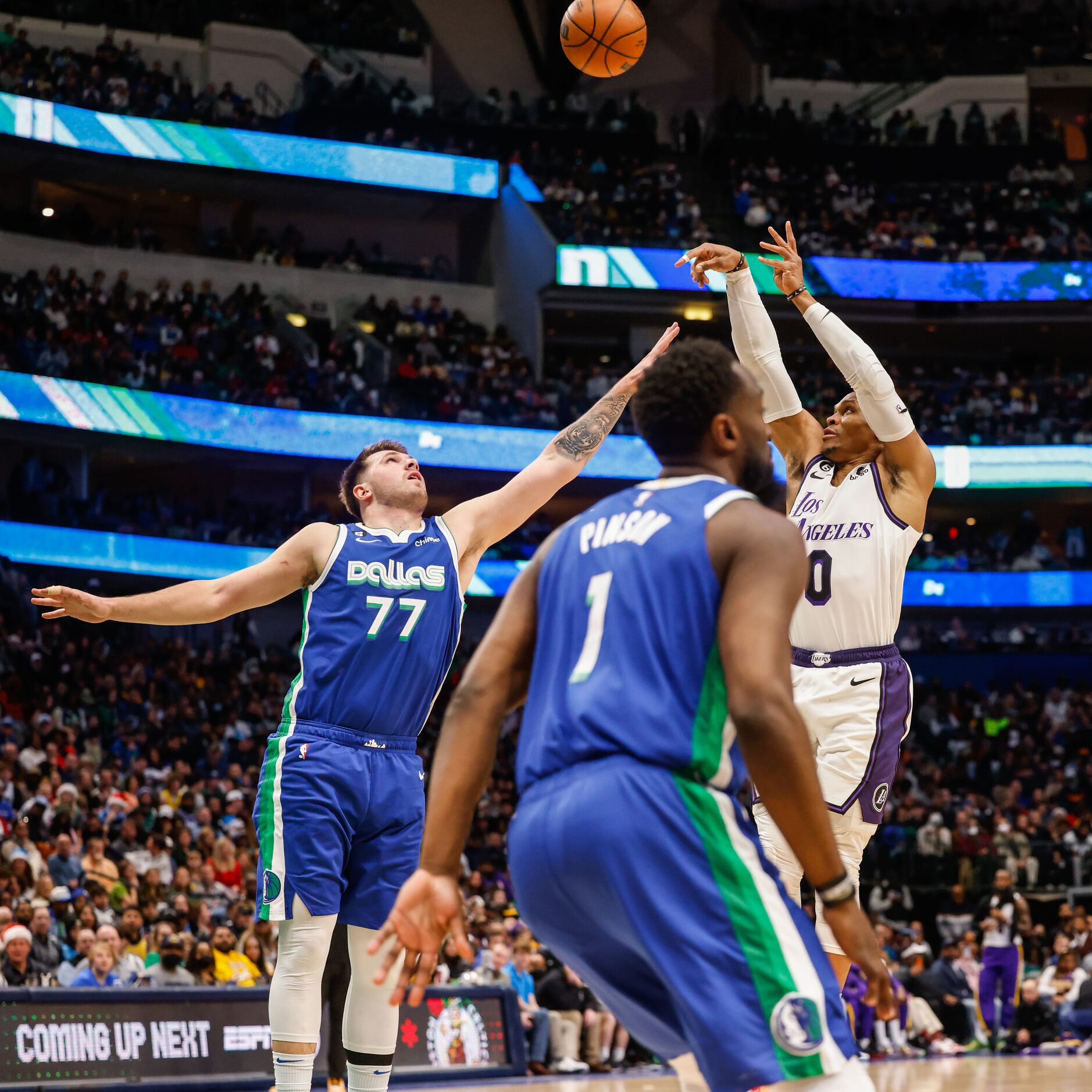 Los Angeles Lakers guard Russell Westbrook (0) goes for a shot as Dallas Mavericks guard...