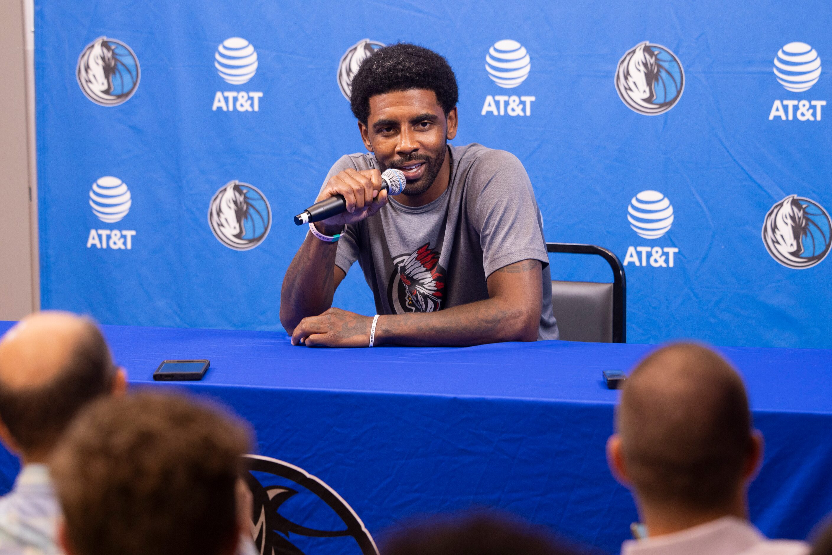 Dallas Mavericks guard Kyrie Irving (11) speaks to reporters at the Mavericks Training...